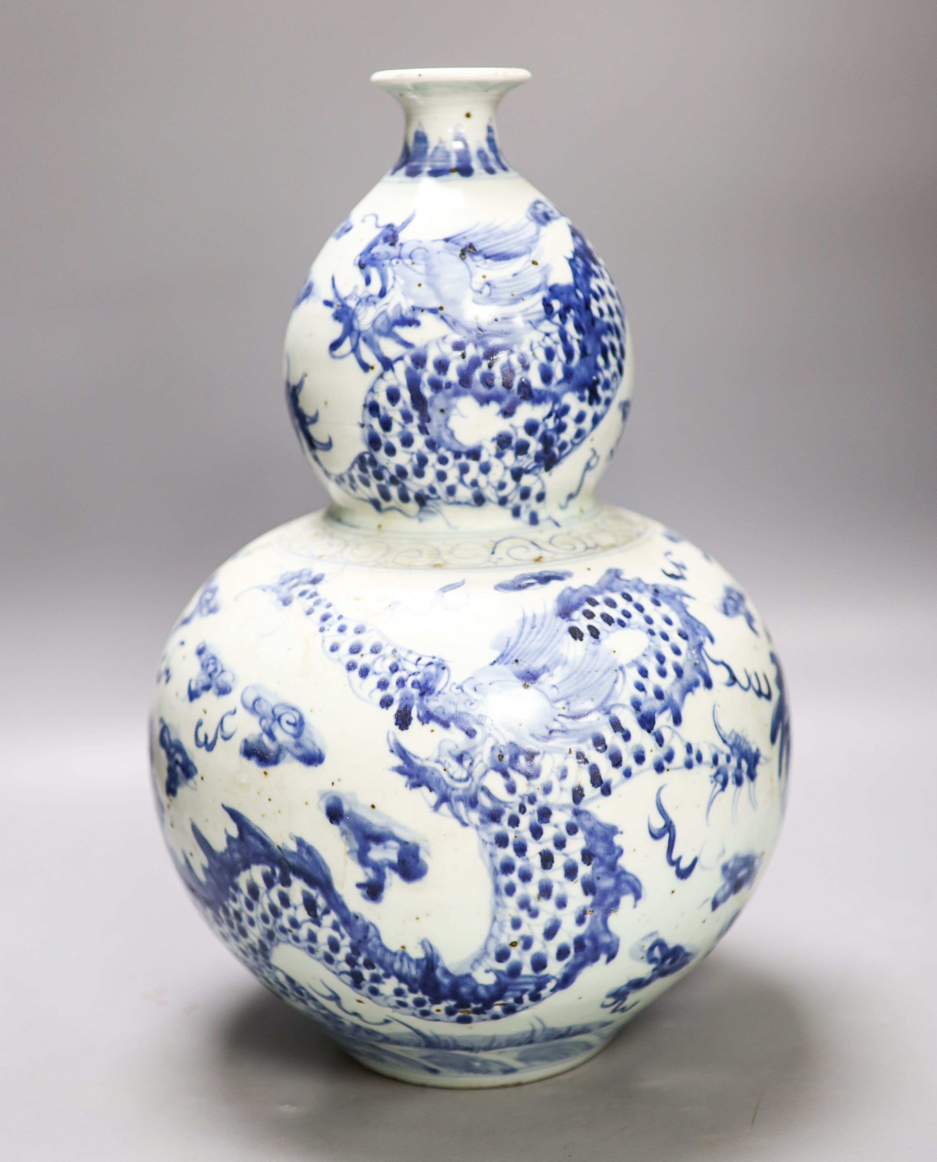 An impressive Chinese blue and white double gourd ‘dragon’ vase 37cm